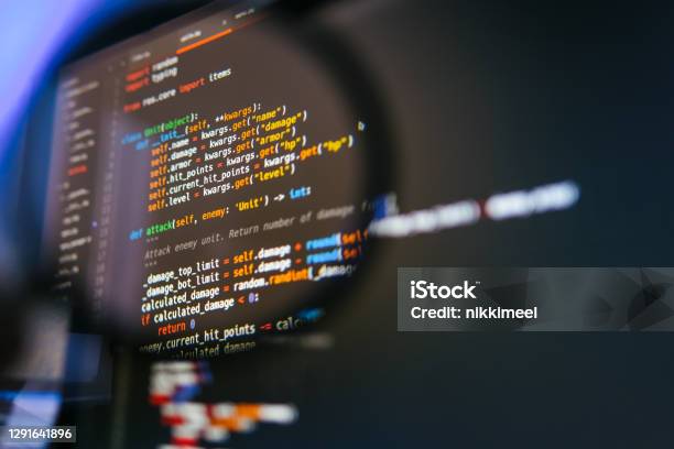 Program Code On Computer Display In Magnifying Glass Closeup Stock ...