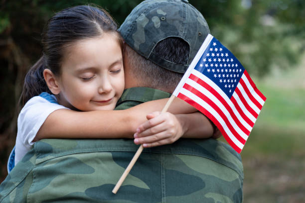 istock American Soldier And His Daughter 1291641961