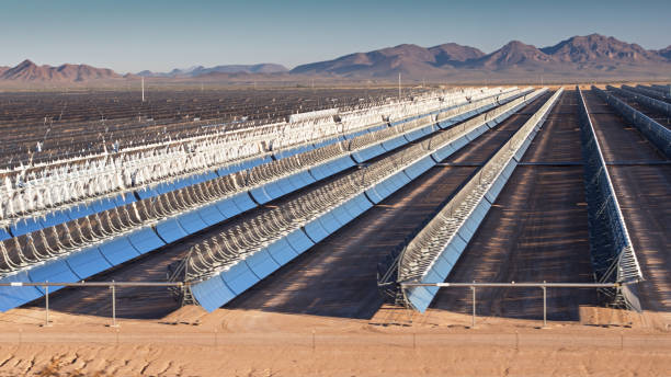 istock Parabolic Trough Solar Plant Mirrors - Aerial 1291642441