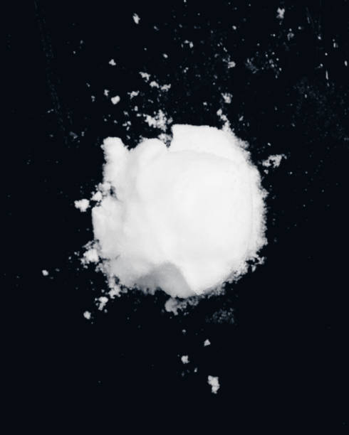 istock snowball splat on black wall 1291643588
