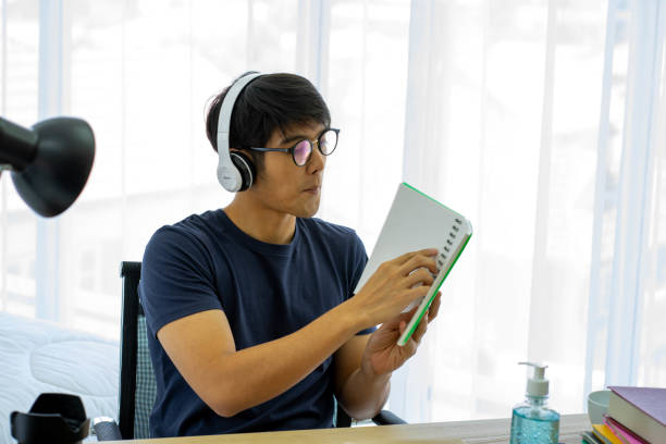 istock Asian business man work from home new normal 1291647086