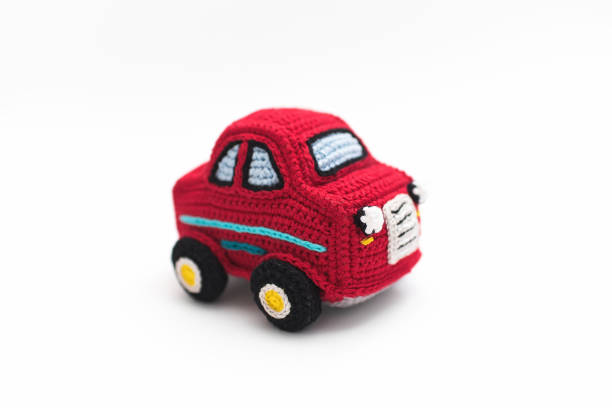 istock Small knitting red baby car 1291649104
