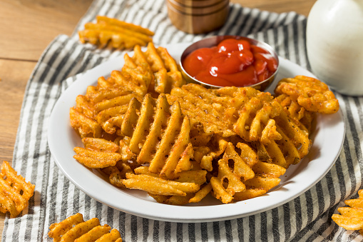 Homemade Greasy Waffle French Fries with Ketchup