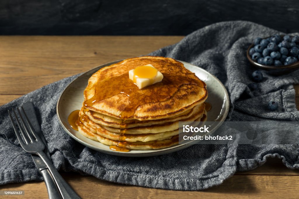 Homemade Sourdough Pancakes with Butter Homemade Sourdough Pancakes with Butter and Blueberries Pancake Stock Photo