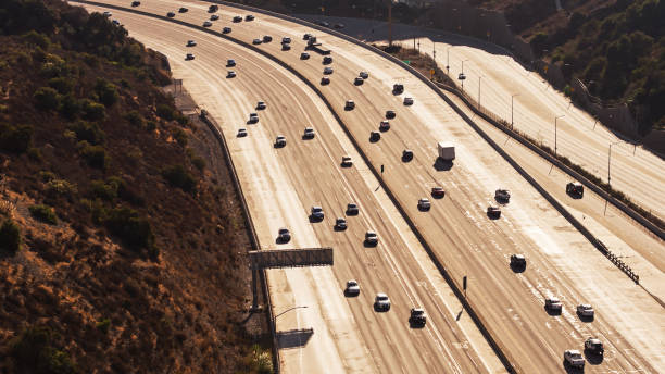 istock Sunlight on Interstate 405 in Sepulveda Pass - Drone Shot 1291655758
