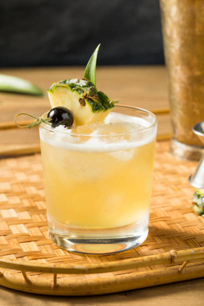 Boozy Refreshing Mai Tai Cocktail Boozy Refreshing Mai Tai Cocktail with Rum and Pineapple mai tai stock pictures, royalty-free photos & images