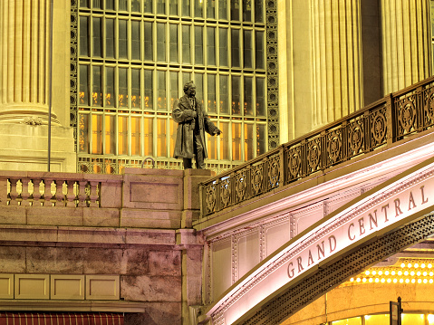 Close up Grand Central Station exterior at night in Manhattan, New York, USA