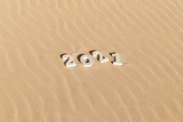 istock 2021 wooden on sand dune texture background 1291660360