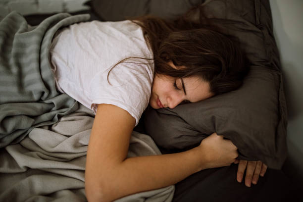 istock Relaxed sleepy woman 1291661998