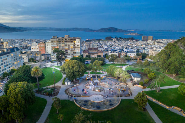 Aerial View Above Lafayette Park in San Francisco Aerial view above Lafayette Park in San Francisco at sunset. Looking out at the San Francisco Bay. san francisco bay stock pictures, royalty-free photos & images