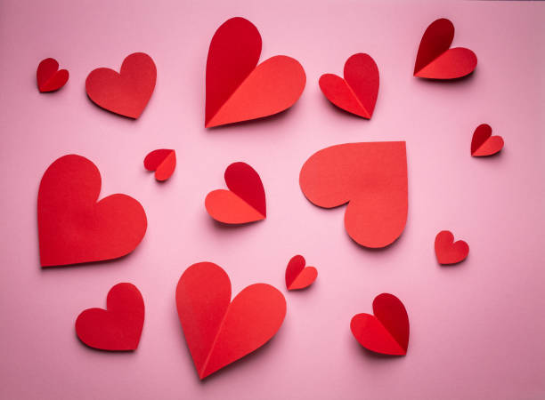 istock Valentine's day background with paper hearts 1291662366