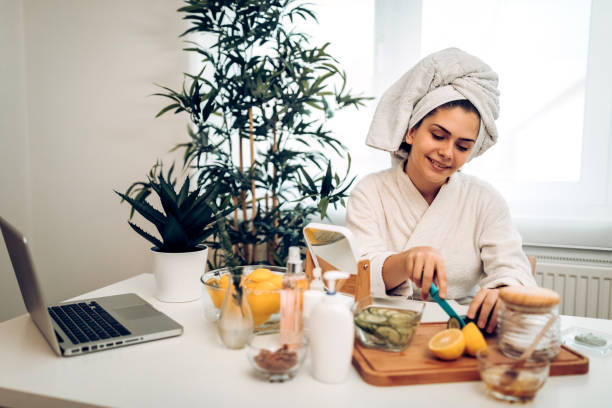 istock Young woman doing make-up in the morning at home 1291663224