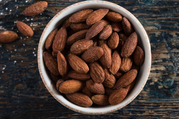 Roasted Salted Almonds in a Bowl stock photo