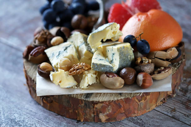istock Blue cheese with fruits and nuts. 1291667583