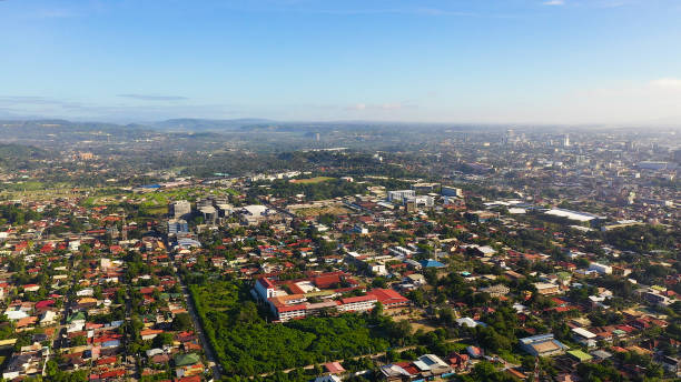 Aerial View of the Davao City Davao city with modern buildings, business centers on the island of Mindanao view from above. Davao del Sur, Philippines. davao city stock pictures, royalty-free photos & images