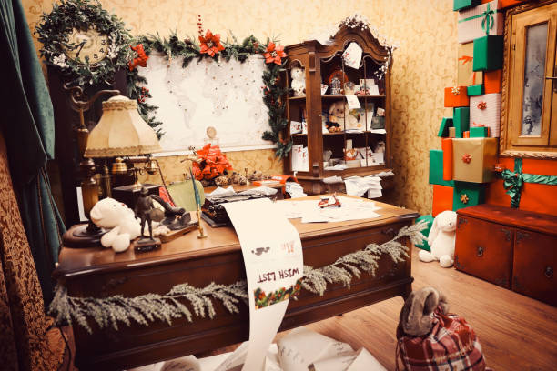 istock Santa Claus work office at Home 1291668785