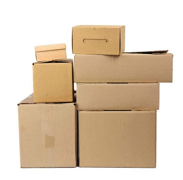 istock stack of closed cardboard brown paper boxes isolated on white background 1291670861