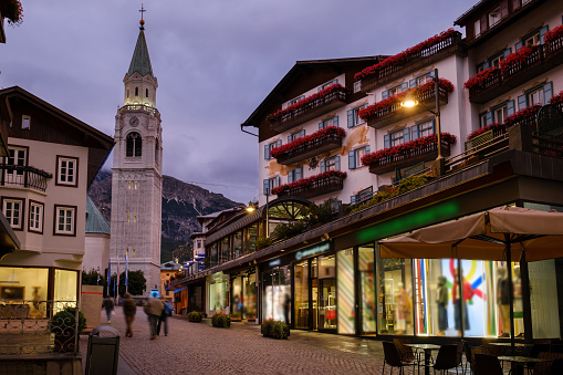 Cortina d'Ampezzo main street in sunset, italian dolomiti alps town