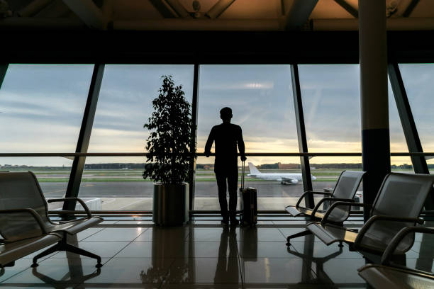 istock Tourist waiting flight in airport 1291678785