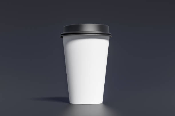 istock White take away coffee paper cup mock up with black lid on black background. 1291689996