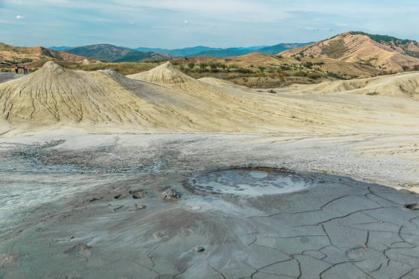 Active mud volcanoes natural phenomenon captured in Romania Active mud volcanoes park captured in Romania at sunset baku national park stock pictures, royalty-free photos & images