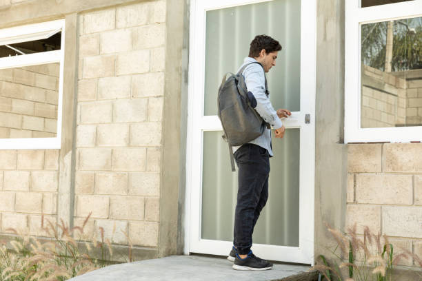 istock handsome and elegant man going to the school. 1291692553