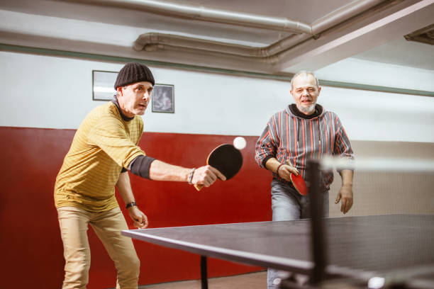 istock Seniors play table tennis recreationally 1291694129
