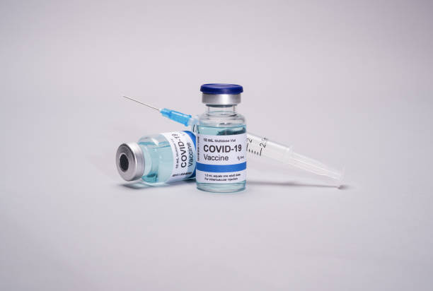 istock Covid-19 vaccine vials and syringe 1291695063