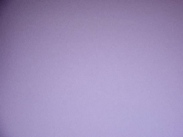 istock Monochrome rough surface in bright purple with a gradient and vignetting around the edges. 1291695864