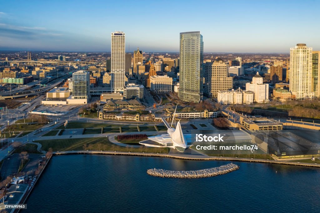 Aerial panorama view of Downtown Milwaukee at sunrise Aerial panorama view of Downtown Milwaukee at sunrise. Tall downtown buildings by the lake Milwaukee - Wisconsin Stock Photo