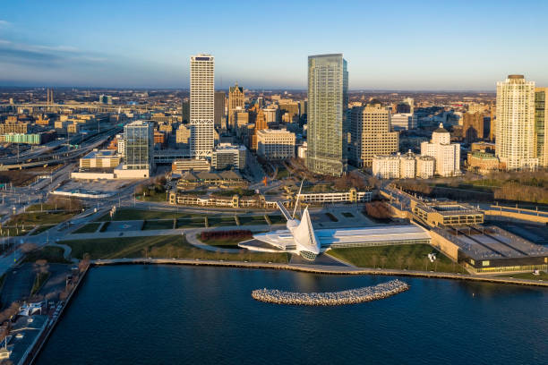 Aerial panorama view of Downtown Milwaukee at sunrise Aerial panorama view of Downtown Milwaukee at sunrise. Tall downtown buildings by the lake milwaukee wisconsin photos stock pictures, royalty-free photos & images