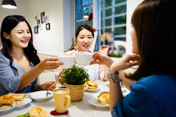istock asian women enjoy eating brunch 1291703164
