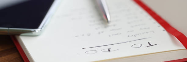 istock On the table is diary with to-do list. 1291710259
