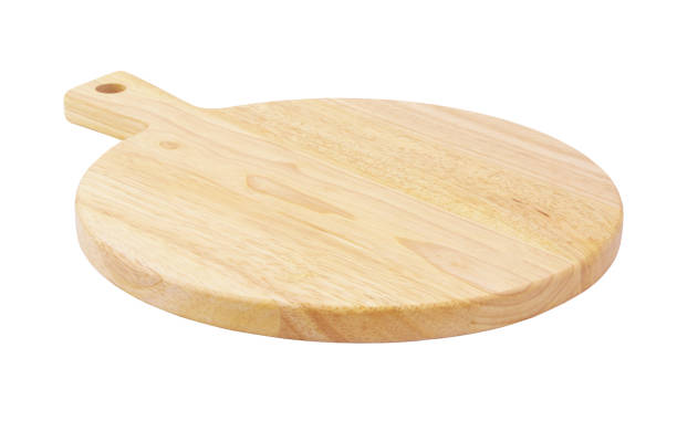 istock Wooden cutting board isolated on white 1291714295