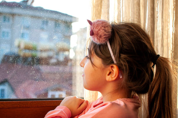 Little cute girl boring at home