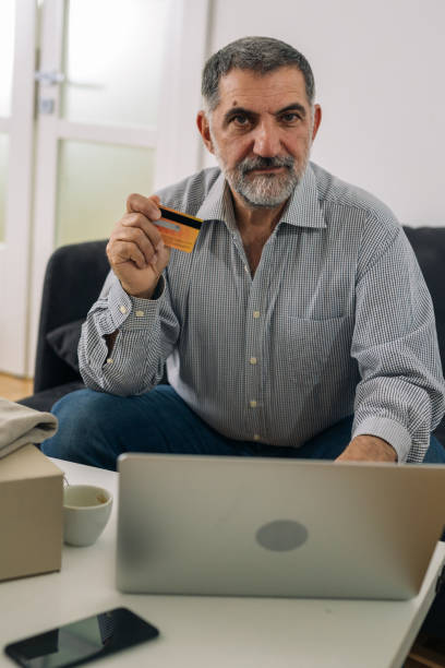 istock man shopping online from his home 1291720348