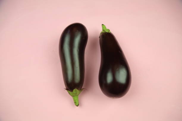 istock Aubergine eggplant isolated on white. Quality photo for your project. 1291720556