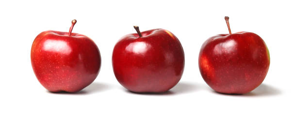 istock Fresh red ripe apples isolated on white background. 1291724024