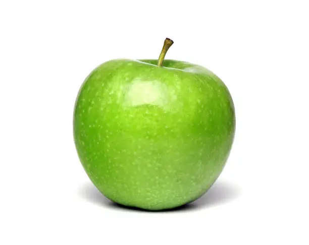 Photo of Green ripe apple isolated on a white background