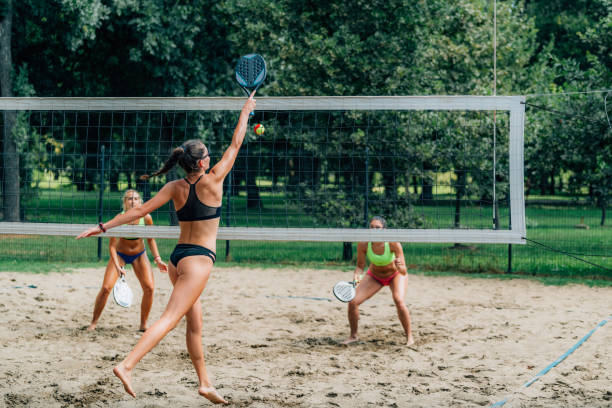istock Beach Tennis Players At The Net 1291725540