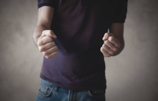 istock Caucasian angry man threatening with fists. 1291728741