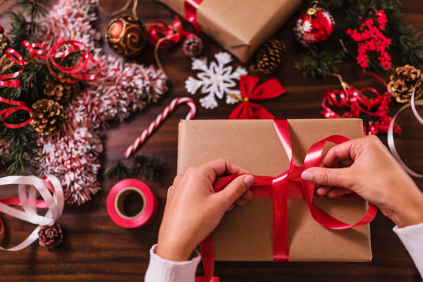 istock Wrapping Christmas gifts 1291729264