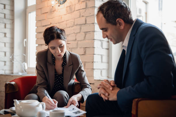 istock Business-team having a meeting at a coffee bar 1291731540