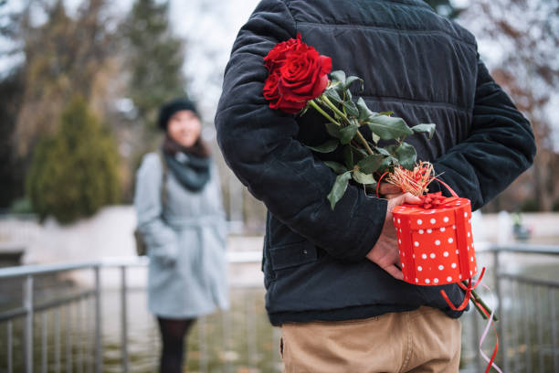 istock Man surprise his girlfriend on Valentine`s Day. 1291732744