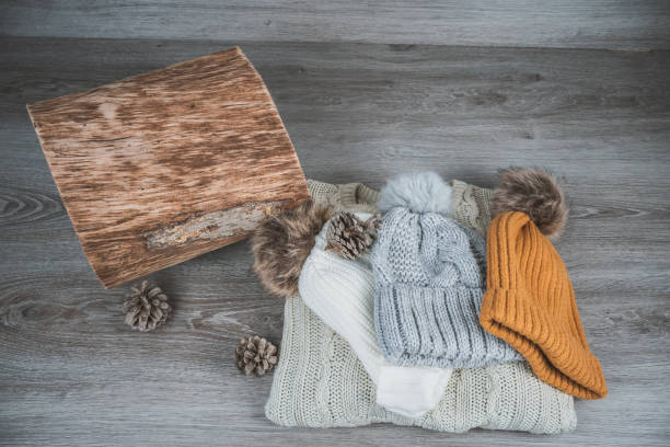 istock Yellow golden wool sweaters and beanies 1291734876