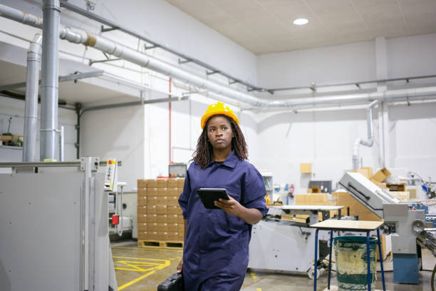 istock Serious African American female worker in protective uniform 1291735206
