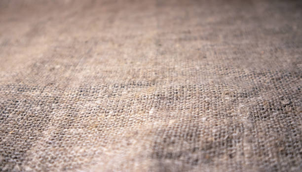 lona de arpillera áspera con desenfoco gradual de cerca - textured bagging rope rough fotografías e imágenes de stock