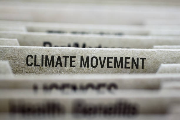 Climate movement labeled file folder tab File folder tab for Climate movement files with shallow DOF and focus on label climate justice photos stock pictures, royalty-free photos & images