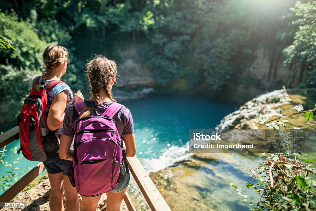 Mother and daughter hiking in Colle di Val d'Elsa, Tuscany, Italy Mother and daughter hiking near river Elsa in Colle di Val d'Elsa, Tuscany.
Nikon D850 Hiking Stock Photo