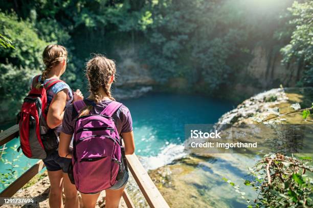 Mother And Daughter Hiking In Colle Di Val Delsa Tuscany Italy Stock Photo - Download Image Now